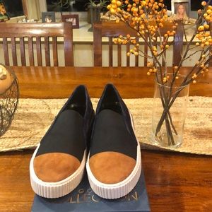 Never been worn super chic Lori Goldstein slip ons
